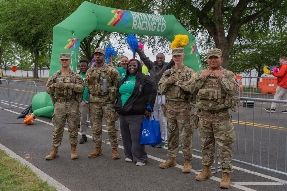Mississippi National Guardsmen patrol during the Autism Speaks Empower Walk &amp; 5K Run in Washington, D.C.