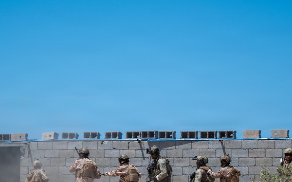 Multinational forces assault shoreline objective during Flintlock 2026