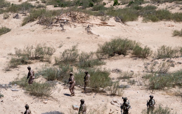 Multinational forces assault shoreline objective during Flintlock 2026