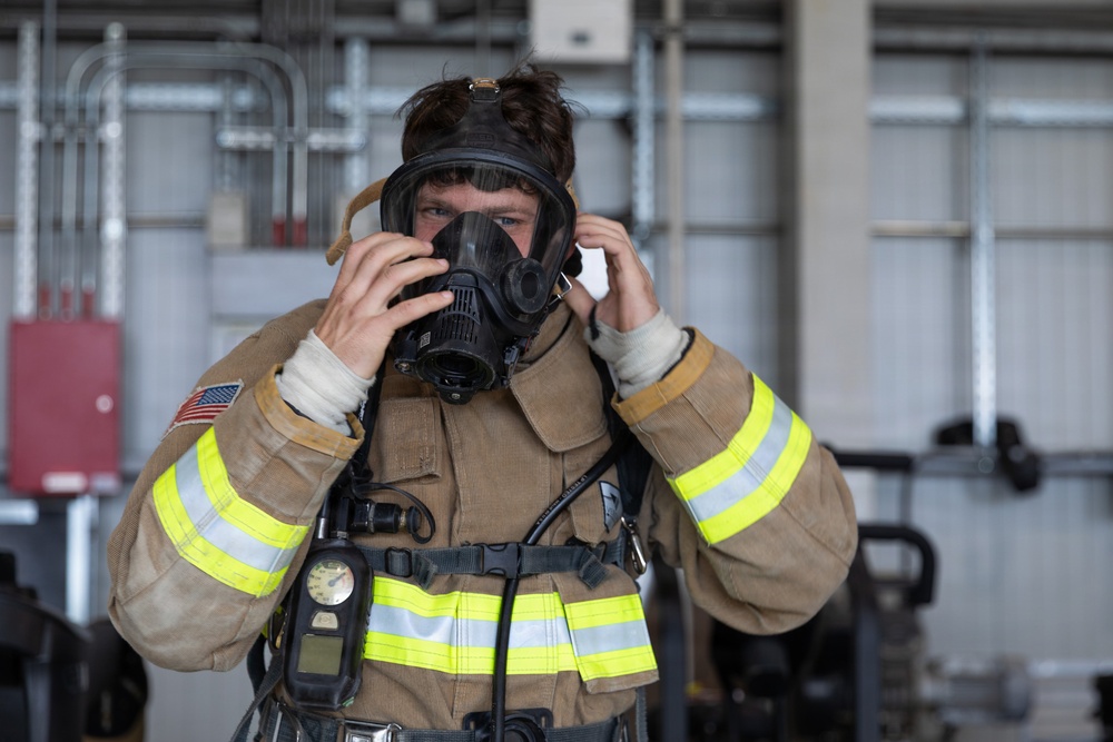 U.S. Army Firefighters conduct downed firefighter rescue training