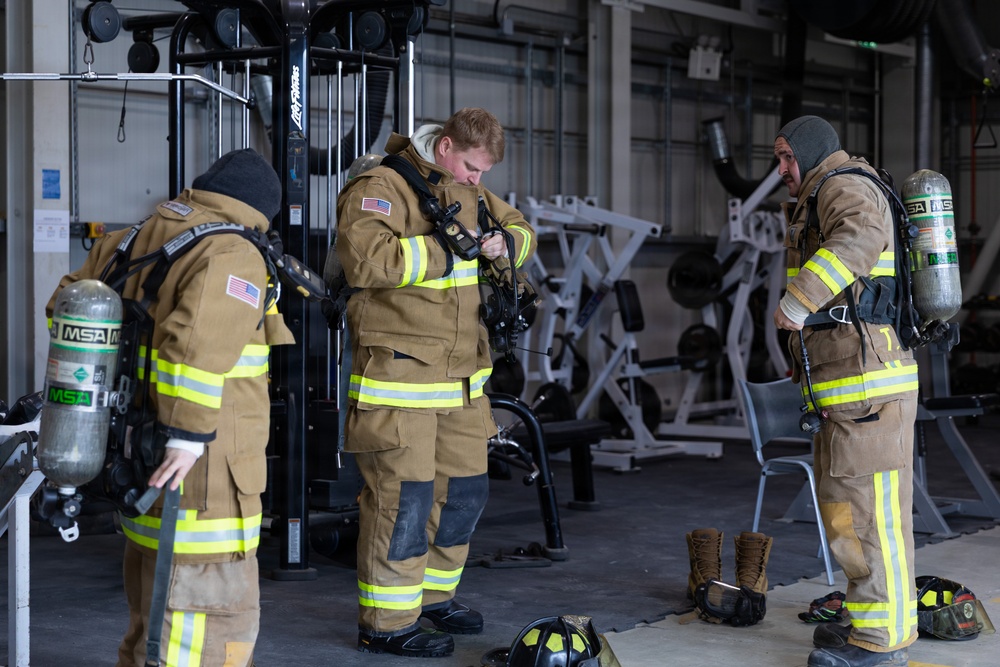 U.S. Army Firefighters conduct downed firefighter rescue training
