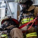 U.S. Army Firefighters conduct downed firefighter rescue training