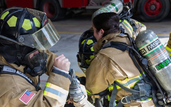 U.S. Army Firefighters conduct downed firefighter rescue training