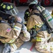 U.S. Army Firefighters conduct downed firefighter rescue training