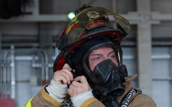 U.S. Army Firefighters conduct downed firefighter rescue training