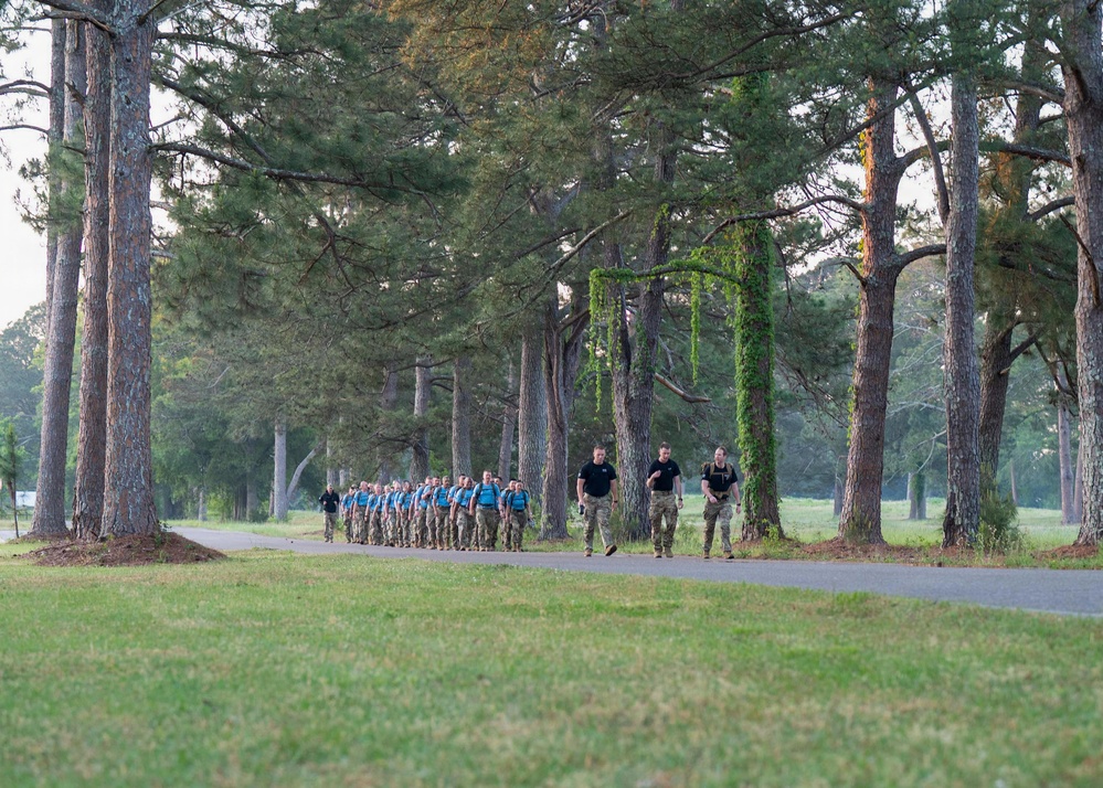 WOTS Class 26-04 Candidates execute week 4 ruck march
