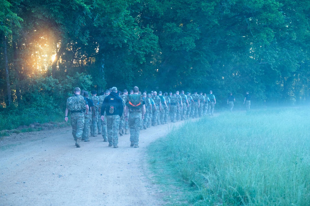 WOTS Class 26-04 Candidates execute week 4 ruck march
