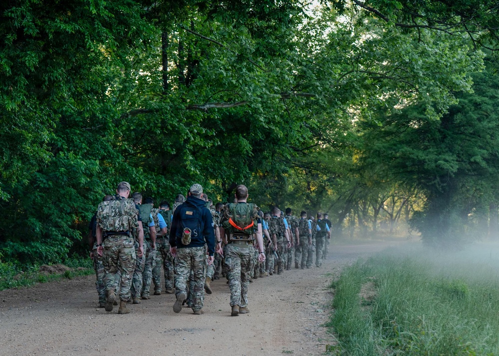 WOTS Class 26-04 Candidates execute week 4 ruck march