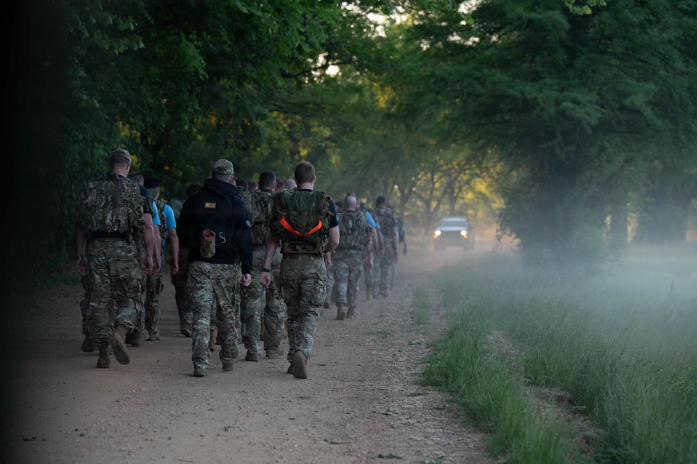WOTS Class 26-04 Candidates execute week 4 ruck march