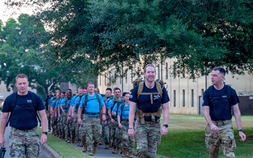 WOTS Class 26-04 Candidates execute week 4 ruck march