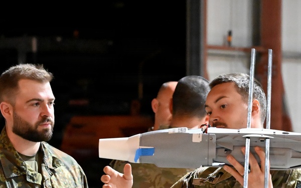 MDC-E Soldiers prepare UAS for test flight at Arcane Thunder 26