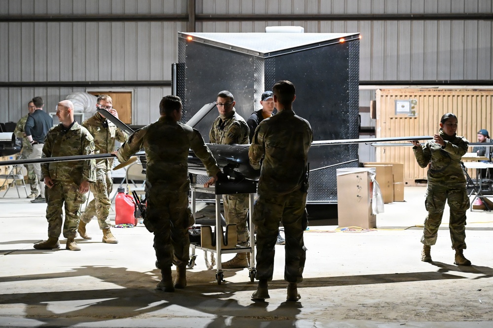 MDC-E Soldiers prepare UAS for test flight at Arcane Thunder 26