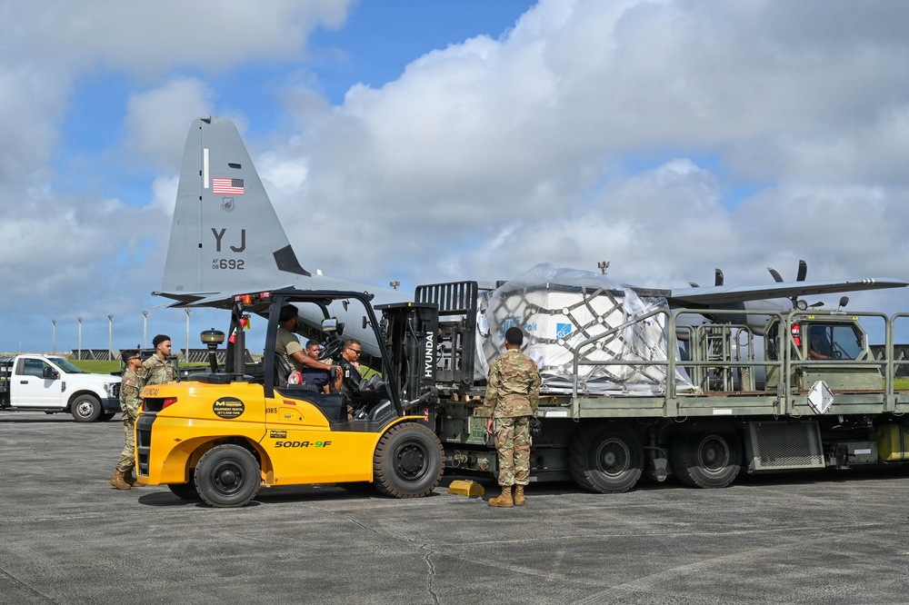 36th Airlift Squadron, 44th Aerial Port Squadron, 734th Air Mobility Squadron and Federal Emergency Management Agency load Humanitarian Aid for Commonwealth Northern Mariana Islands departure