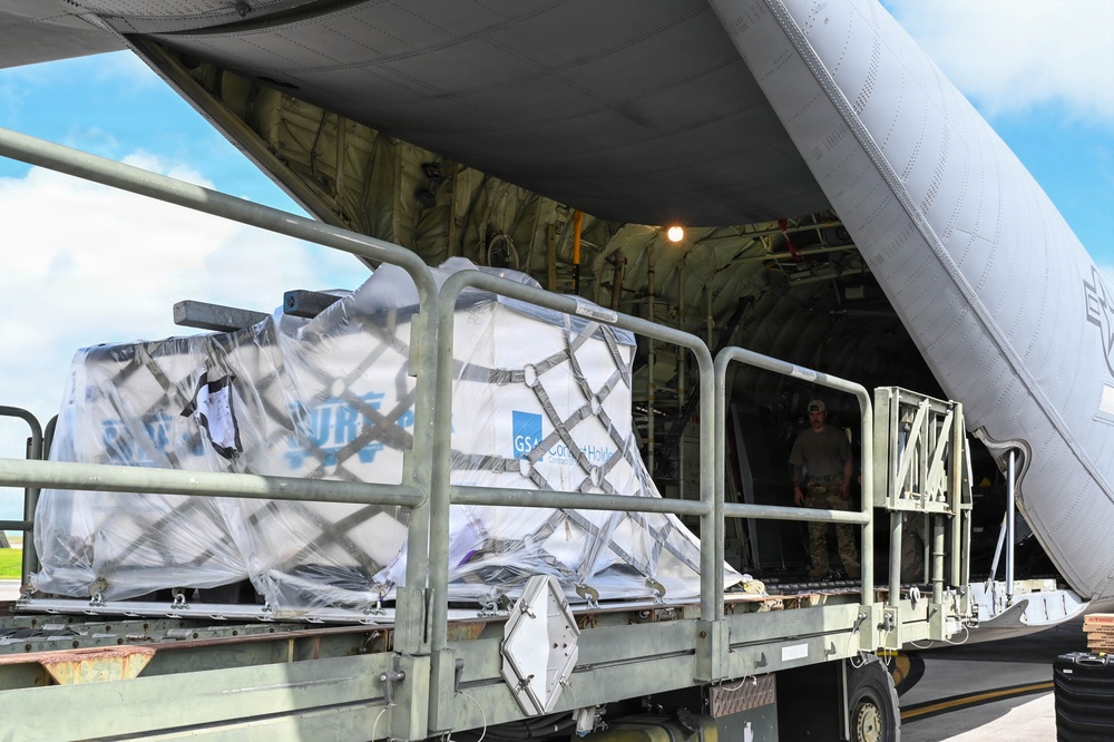 36th Airlift Squadron, 44th Aerial Port Squadron, 734th Air Mobility Squadron and Federal Emergency Management Agency load Humanitarian Aid for Commonwealth Northern Mariana Islands departure