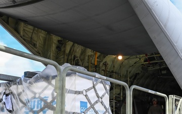 36th Airlift Squadron, 44th Aerial Port Squadron, 734th Air Mobility Squadron and Federal Emergency Management Agency load Humanitarian Aid for Commonwealth Northern Mariana Islands departure
