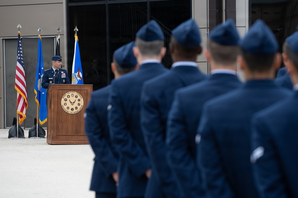 Air Force Chief of Staff Gen. Ken Wilsbach celebrates the newest Airmen