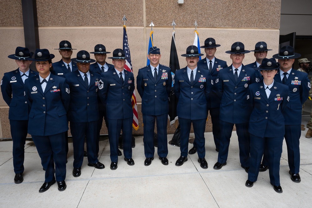 Air Force Chief of Staff Gen. Ken Wilsbach celebrates the newest Airmen