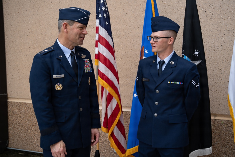 Air Force Chief of Staff Gen. Ken Wilsbach celebrates the newest Airmen
