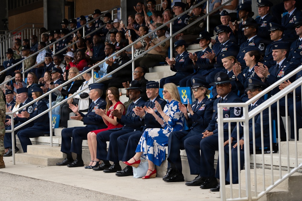 Air Force Chief of Staff Gen. Ken Wilsbach celebrates the newest Airmen