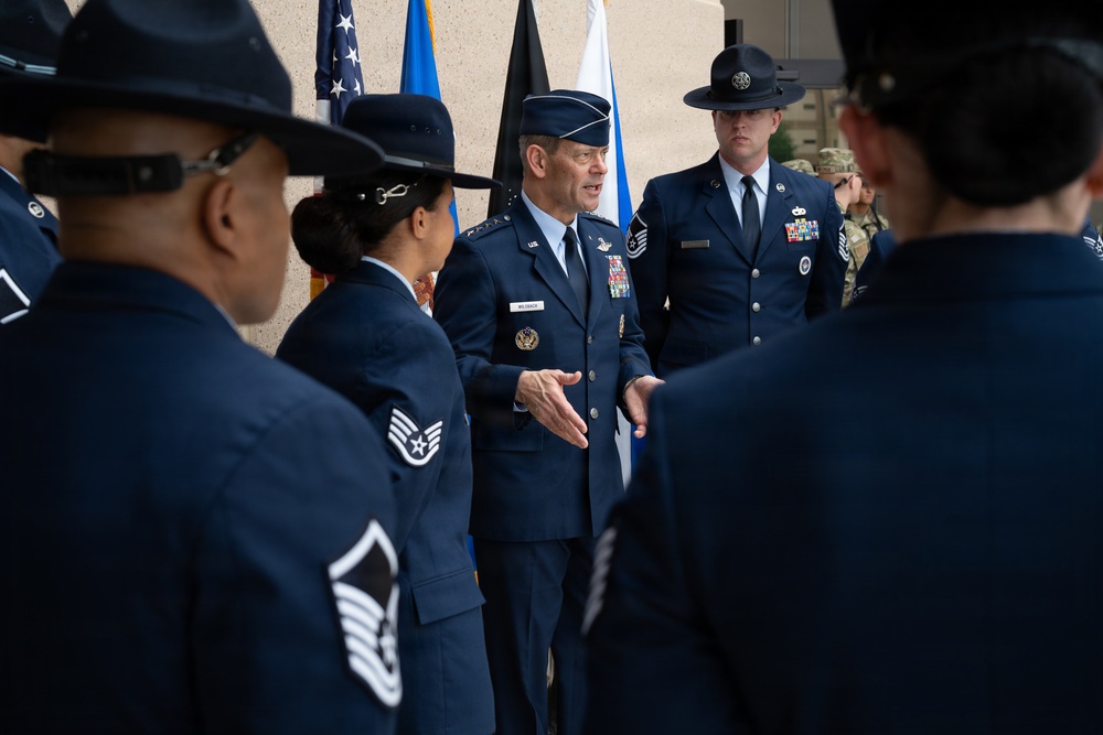 Air Force Chief of Staff Gen. Ken Wilsbach celebrates the newest Airmen