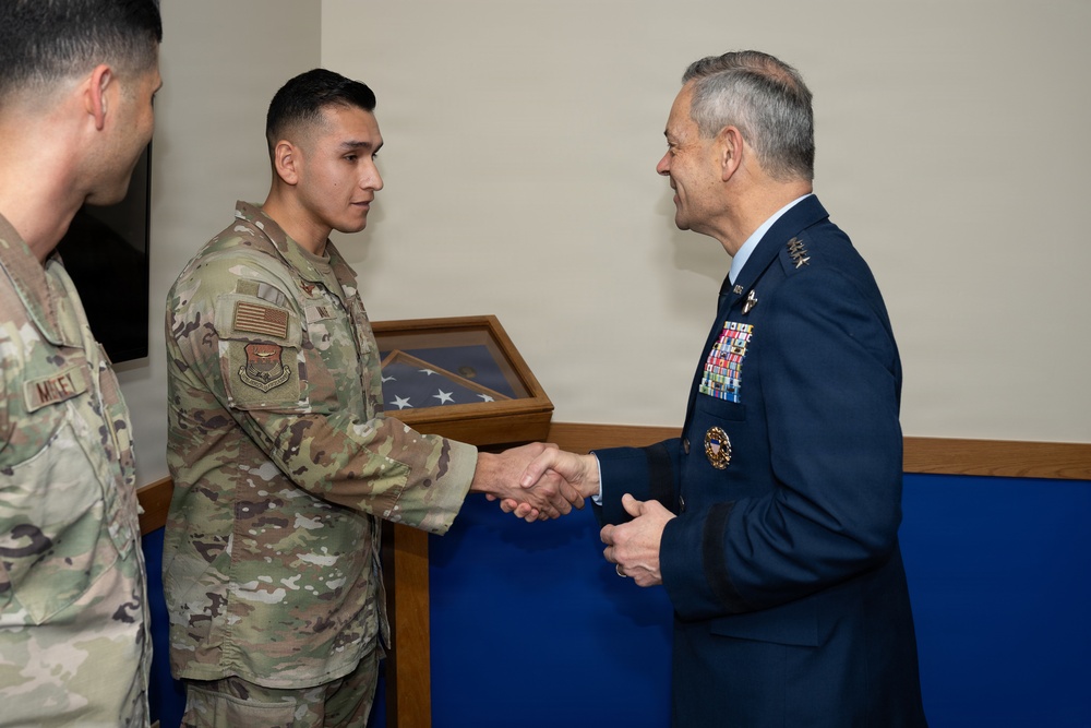 Air Force Chief of Staff Gen. Ken Wilsbach celebrates the newest Airmen