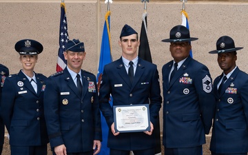 Air Force Chief of Staff Gen. Ken Wilsbach celebrates the newest Airmen