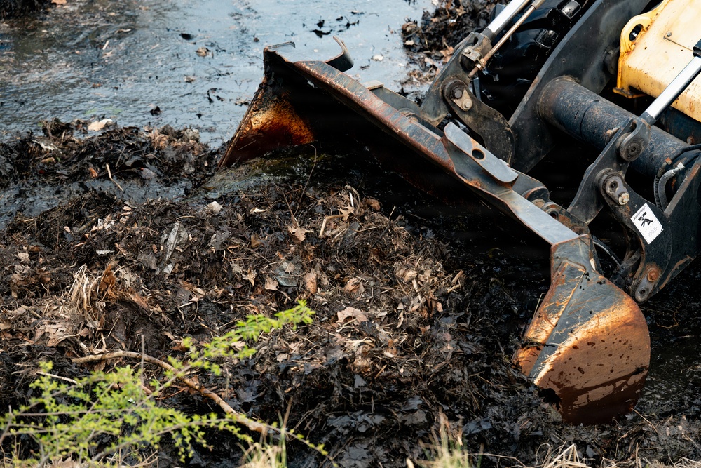 In the muck and making a difference