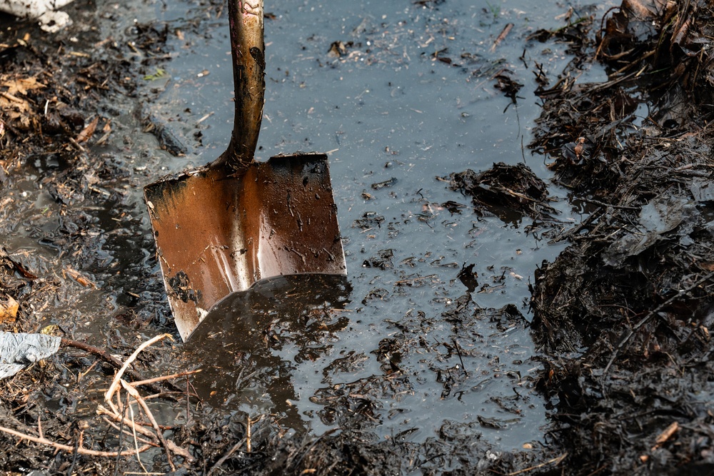 In the muck and making a difference