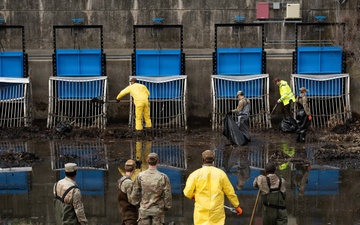In the muck and making a difference