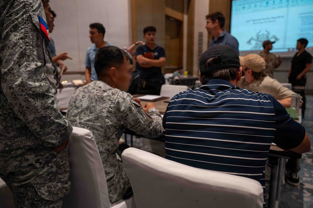 Balikatan 2026: Philippine Air Force members integrate with AFSOC Airmen for mission planning ahead of combined training