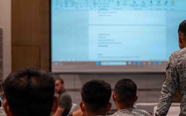 Balikatan 2026: Philippine Air Force members integrate with AFSOC Airmen for mission planning ahead of combined training