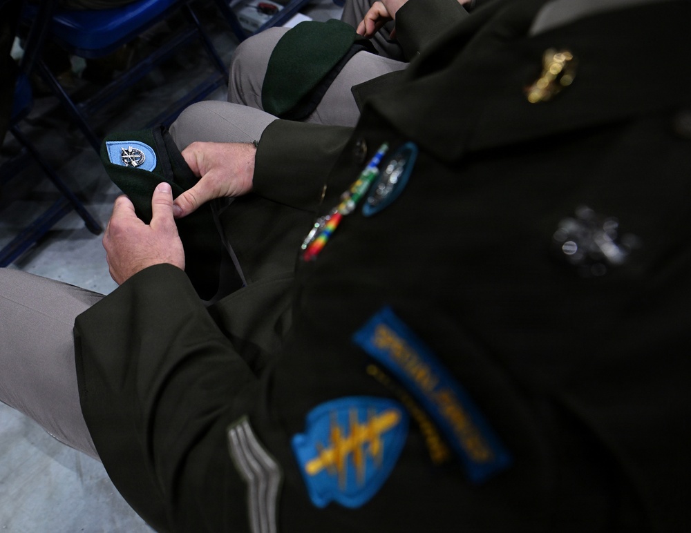 Soldiers Don Green Beret During Special Forces Graduation