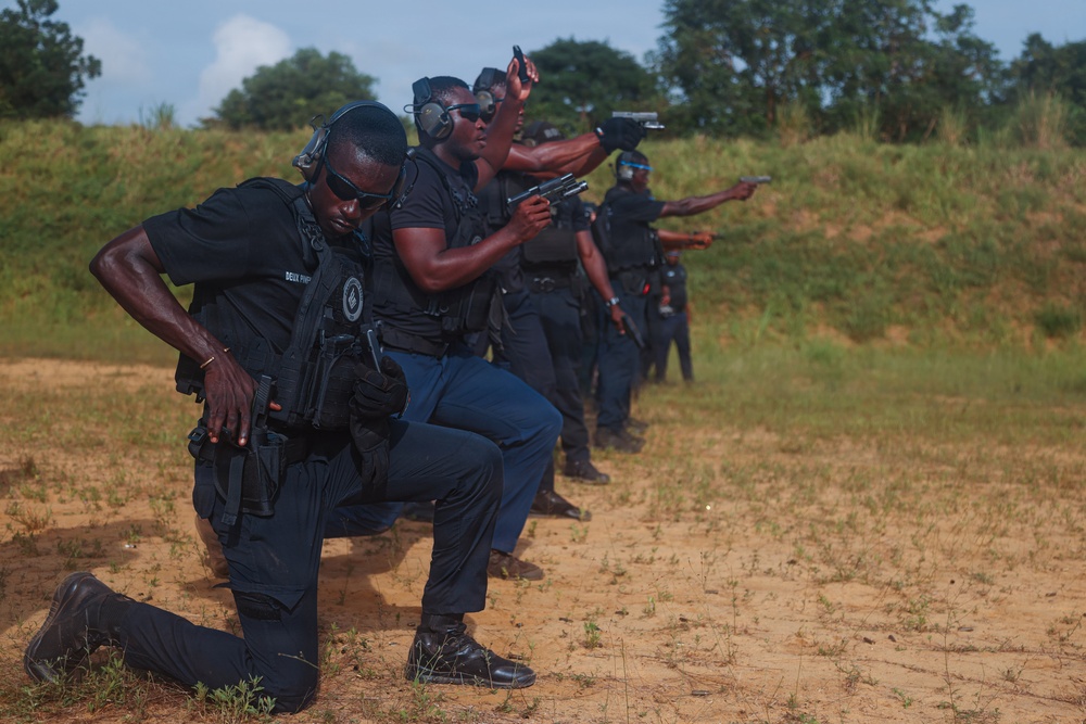 Ivorian law enforcement executes pistol marksmanship drills during Flintlock 26