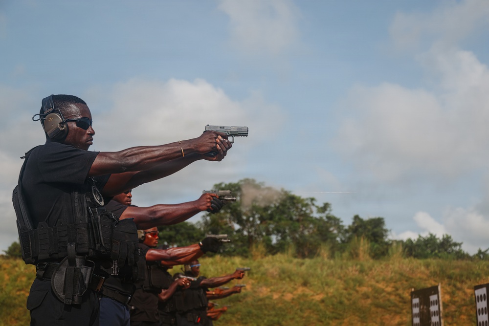 Ivorian law enforcement executes pistol marksmanship drills during Flintlock 26