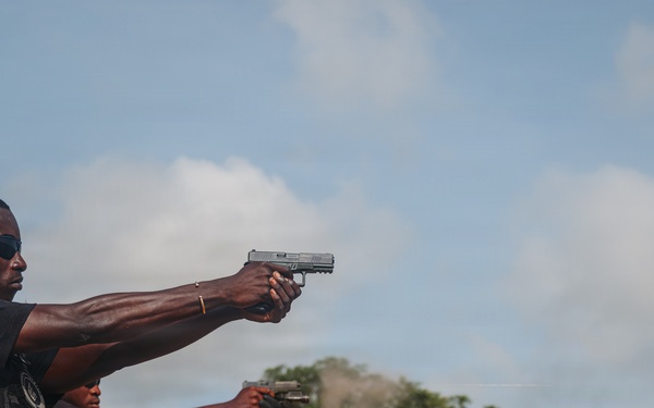 Ivorian law enforcement executes pistol marksmanship drills during Flintlock 26