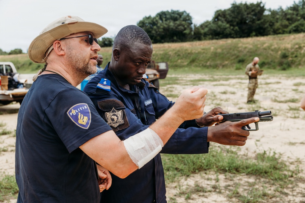 Ivorian law enforcement executes pistol marksmanship drills during Flintlock 26