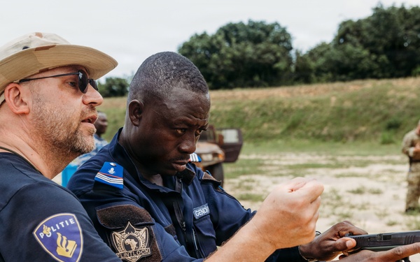 Ivorian law enforcement executes pistol marksmanship drills during Flintlock 26