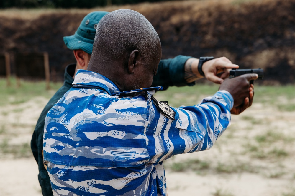 Ivorian law enforcement executes pistol marksmanship drills during Flintlock 26