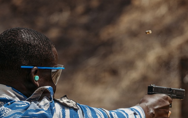 Ivorian law enforcement executes pistol marksmanship drills during Flintlock 26