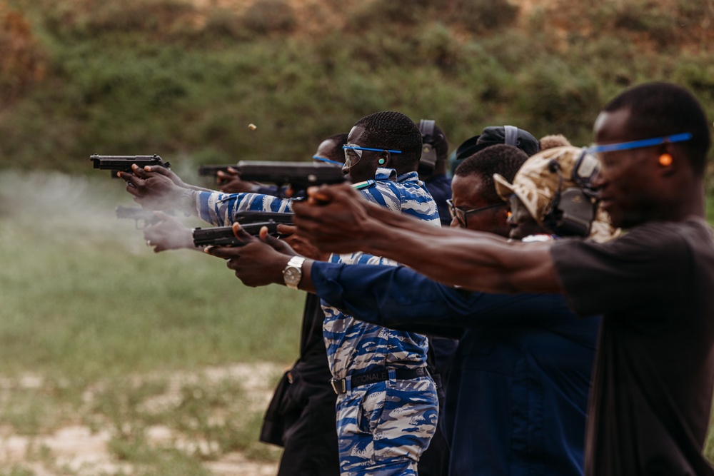Ivorian law enforcement executes pistol marksmanship drills during Flintlock 26