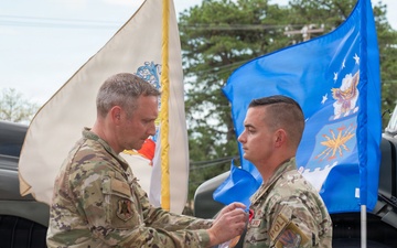 New Jersey Air National Guard Airman receives Bronze Star medal during ceremony at the 177th Fighter Wing