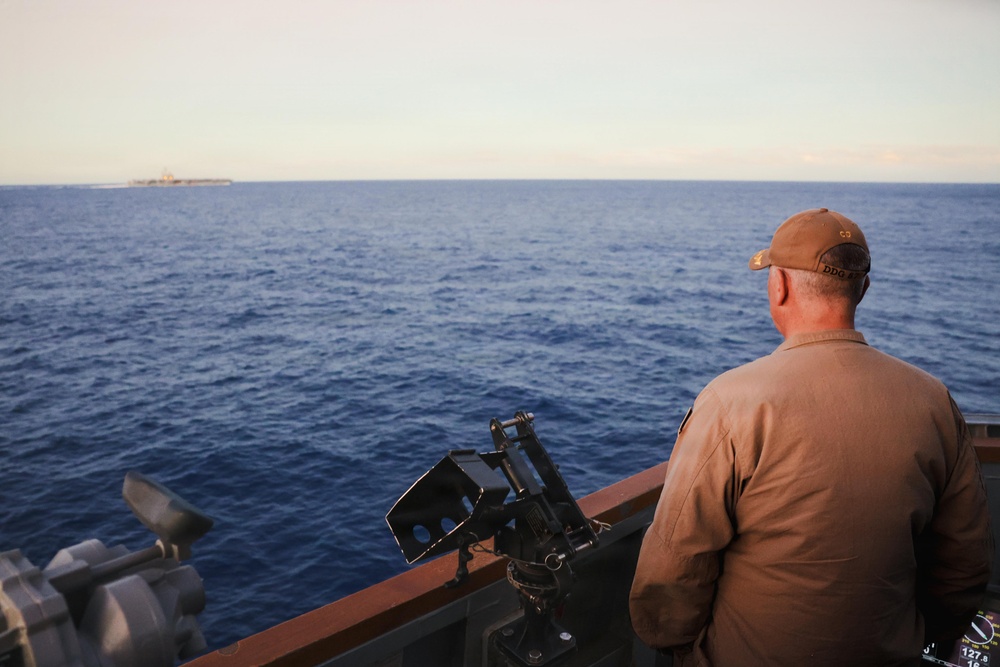 USS George H.W. Bush (CVN 77) Sails Alongside USS Mason (DDG 87)