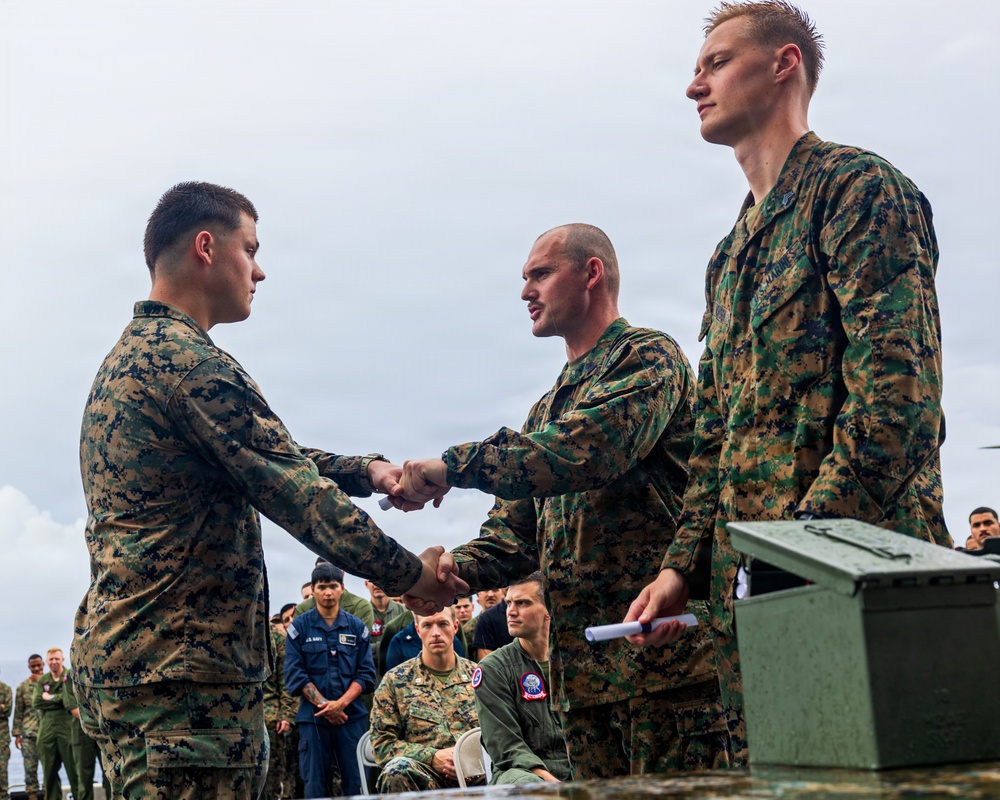 11th MEU Marines, USS Boxer Sailor Graduate Corporals Course While Underway