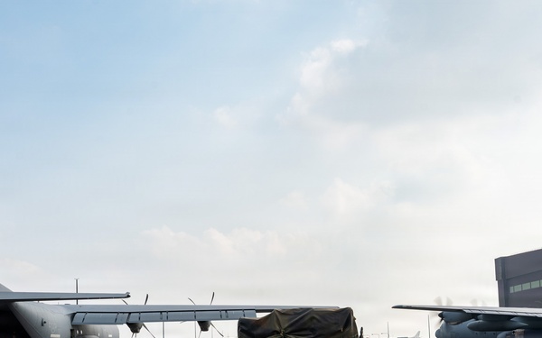 Balikatan 2026: 317th AW, 25th ID load Humvee, howitzer onto C-130J