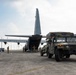 Balikatan 2026: 317th AW, 25th ID load Humvee, howitzer onto C-130J