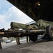 Balikatan 2026: 317th AW, 25th ID load Humvee, howitzer onto C-130J