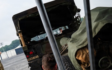 Balikatan 2026: 317th AW, 25th ID load Humvee, howitzer onto C-130J