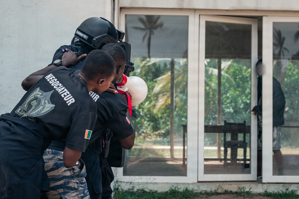 Ivorian national police officers execute urban clearing operations during Flintlock 26