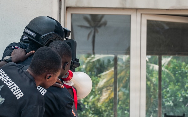 Ivorian national police officers execute urban clearing operations during Flintlock 26