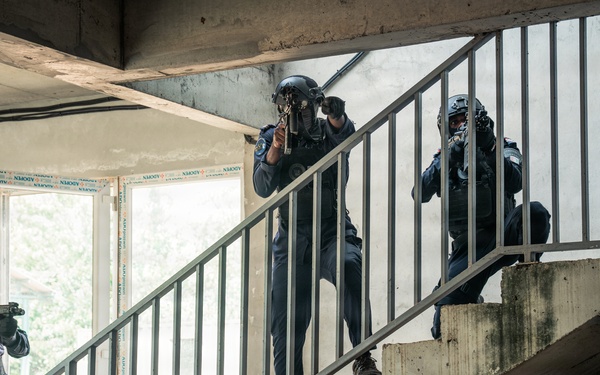Ivorian national police officers execute urban clearing operations during Flintlock 26